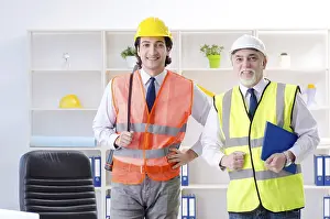 One Person Working Drucke: Two engineers colleagues working under project