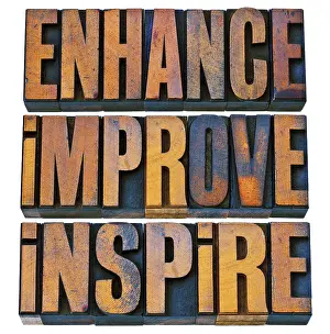 Vintage Letterpress Printing Drucke: Enhance, improve, inspire - a collage of isolated motivational words in vintage letterpress wood type printing blocks