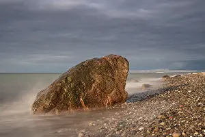 Motion Blur Photography Drucke: An erratic boulder on the Baltic coast