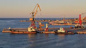 Greek Harbour Scene Drucke: Evening light, pier, loading cranes