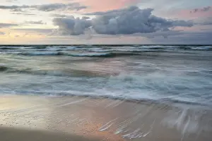 Atmospheric Evening Light In Europe Drucke: Evening mood on the sandy beach