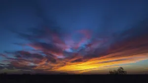 Evening Sky Drucke: Evening sky with clouds at sunset