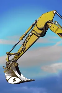 European Construction Drucke: An excavator on a construction site during construction work