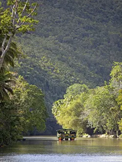 Uninhabited River Course Drucke: Excursion boat on the Loboc River