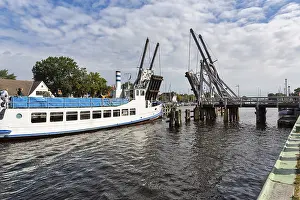 Excursion Boat Germany Drucke: Excursion boat passing through open drawbridge