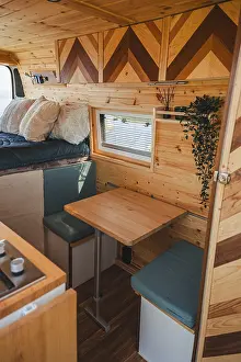 Cozy Camper Interior Drucke: Experience comfort and functionality with this cozy camper interior