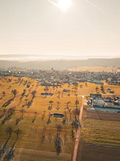 Southern German Autumn Colors Drucke: Extensive fields and trees with village in the background
