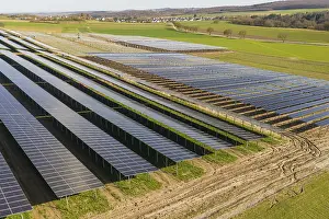Aerial View Farmland Drucke: Extensive solar fields in a rural area