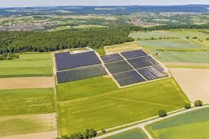 Diverse Landscape Photography Drucke: Extensive solar panel systems in the midst of a diverse landscape