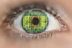 Data Transmission Control Drucke: Detail of eye with barcode EAN