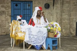 Female Fortune Teller Drucke: Fortune teller posing with a cigar