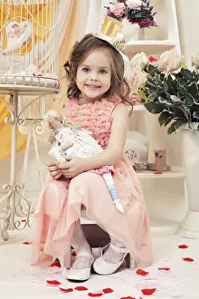 Elegant Lady Pose Drucke: Fancy little model posing with doll in retro interior