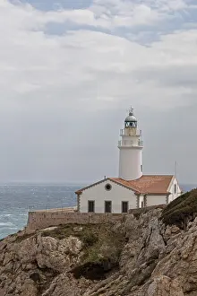 European Coastal Landmark Drucke: Far de Capdepera lighthouse, cliffs