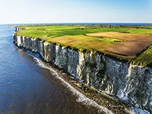 Yorkshire Landscape Drucke: Farm and Fields over Bempton Cliffs from a drone