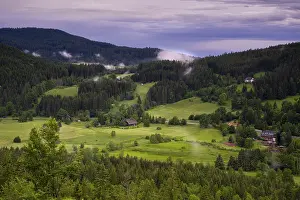Southern Germany Stormy Weather Drucke: Some farms surrounded by meadows and forest