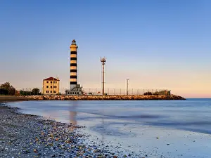 Sea Mark Navigation Drucke: Faro lighthouse in the evening light