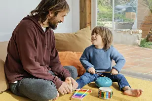 Recreational Activities For Families Drucke: Father son playing together