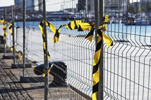 Empty Construction Area Drucke: Fence with ribbons on a construction site