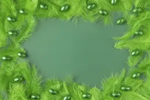 Holiday Decoration Ideas Drucke: A festive green feather background with shiny Easter eggs as a frame