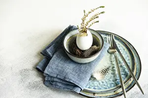 Traditional Easter Meal Setup Drucke: Festive table setting for holiday Easter dinner decorated with eggs