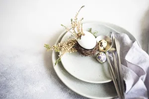 Festive Holiday Dinner Drucke: Festive table setting for holiday Easter dinner decorated with eggs