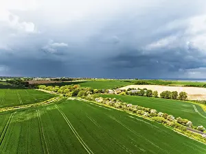 Agricultural Landscape From Above Drucke: Fields and Windmill from a drone