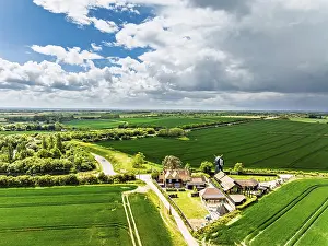 European Countryside Scene Drucke: Fields and Windmill from a drone