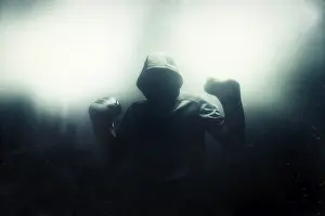 Boxing Concept Image Drucke: Fighter without a face is standing with his hands up