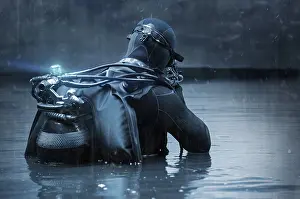 Symbolic Image Of Strength Drucke: Fighter of a special unit is immersed in scuba diving