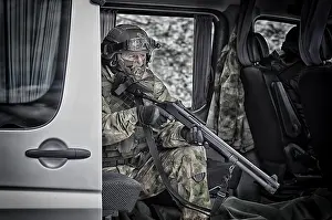 Special Unit Fighter Drucke: The fighter of a special unit performs a dangerous mission