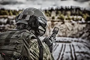 Mid Adult Male Drucke: The fighter of a special unit performs a dangerous mission
