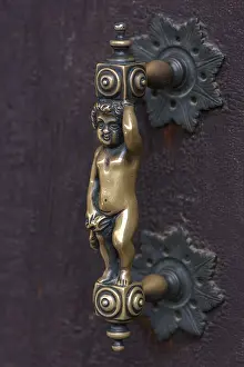 UNESCO World Heritage Site Image Drucke: Figure as door handle on a gate