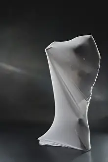 Dark Background Art Drucke: A figure is partially veiled in translucent fabric