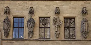 Town Hall In Central Europe Drucke: Figures on the facade of the town hall