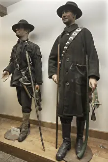 German Federal Republic Heritage Drucke: Figures of shepherds from Thuringia in the foreground and from the Harz Mountains behind in a showcase