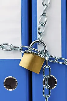 Locked File Folder Drucke: A file folder locked with a chain and padlock