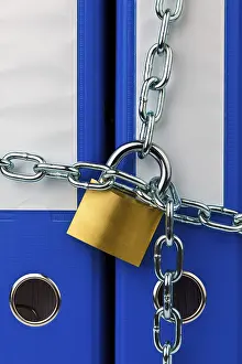 Locked File Folder Drucke: A file folder locked with a chain and padlock