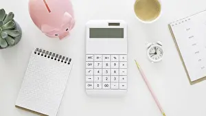 Deserted Office Space Drucke: Finance elements arrangement with empty notepad calculator