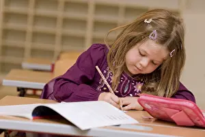 Elementary School Child Drucke: Firstgrader during a lesson