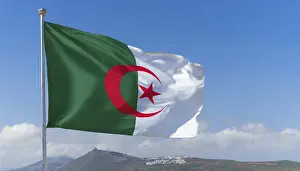 Empty Landscape With Flag Drucke: The flag of Algeria flutters in the wind