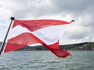 Upper Austria Scenery Drucke: Flag of Austria flying in the wind