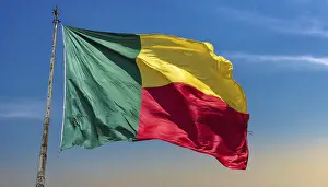 Isolated Flag Image Drucke: The flag of Benin flutters in the wind
