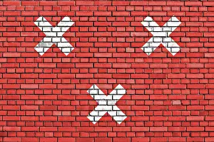 Painted Brick Wall Drucke: Flag of Breda painted on brick wall
