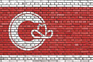 Painted Brick Wall Drucke: Flag of Calgary painted on brick wall