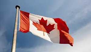Symbolic National Emblem Drucke: The flag of Canada flutters in the wind