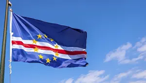 Blue Sky National Symbol Drucke: The flag of Cape Verde flutters in the wind