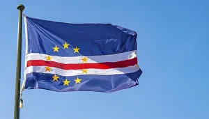 National Colors Blue And Red Drucke: The flag of Cape Verde flutters in the wind