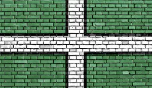British Nationality Symbol Drucke: Flag of Devon painted on brick wall