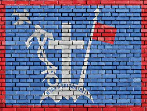 Brick Wall Art Drucke: Flag of Hydra painted on brick wall
