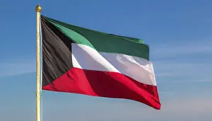 Asian Flags Drucke: The flag of Kuwait flutters in the wind
